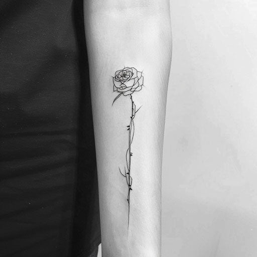 Minimalist flat tattoo sketch of a single rose