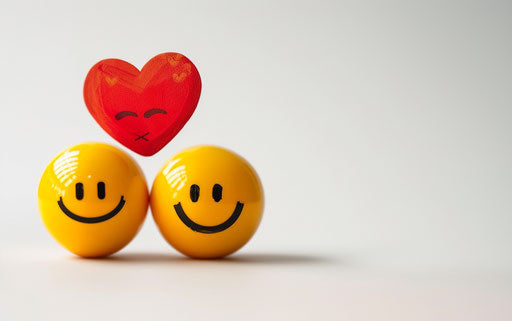 Two yellow smiley faces with a red heart above their heads, white background, Pixar style.