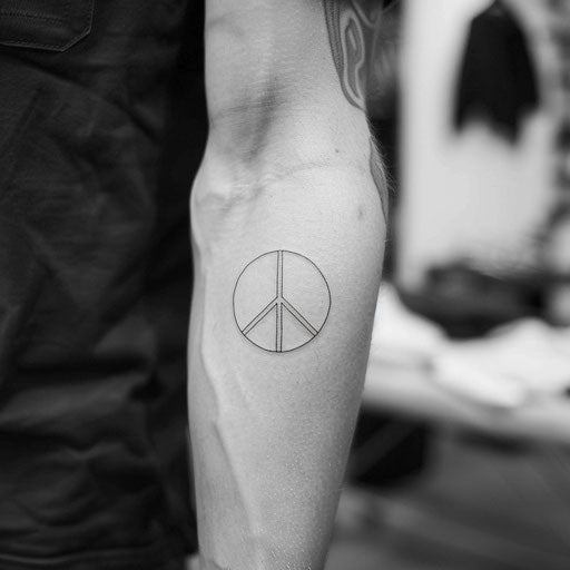 Classic peace tattoo sketch with a timeless peace sign in black outline