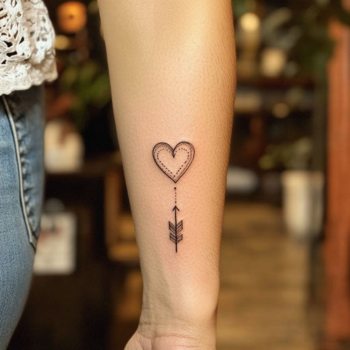 A minimalist heart and arrow tattoo sketch for small forearm