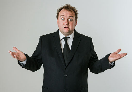 Confused overweight businessman in black suit on white