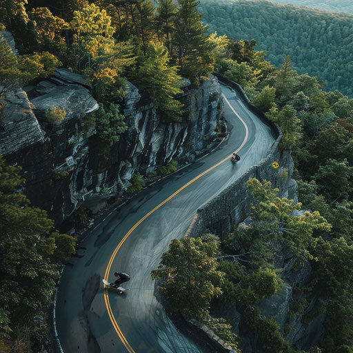 Downhill skateboarder racing friends on windy mountain, aerial view 8k