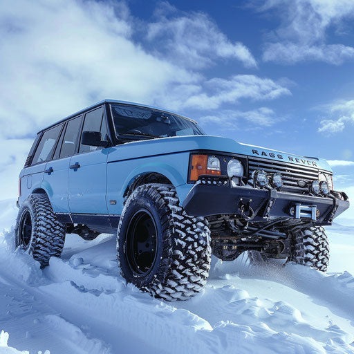 Ice-blue 1995 Range Rover with fat tires tackling Arctic snow