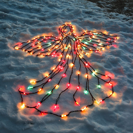 Christmas angel drawn in snow with colorful lights