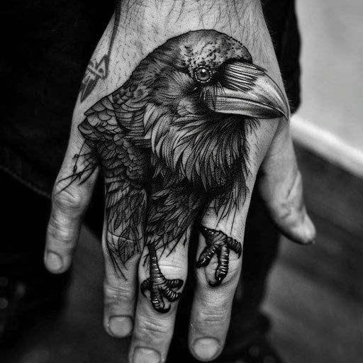 Tiny hand tattoos of a raven, in the style of Adrian Smith