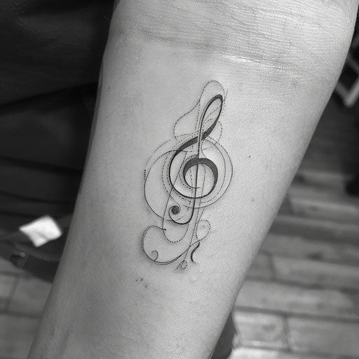 Flat tattoo sketch of a single line morphing into a musical clef