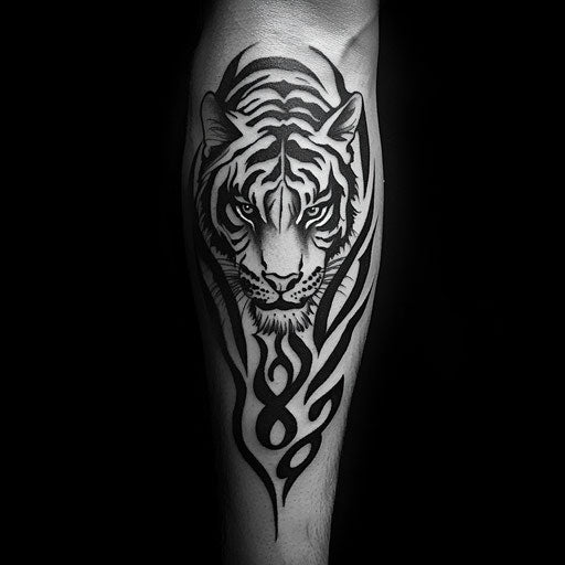 Tribal tattoos for men with a tribal tiger on the forearm