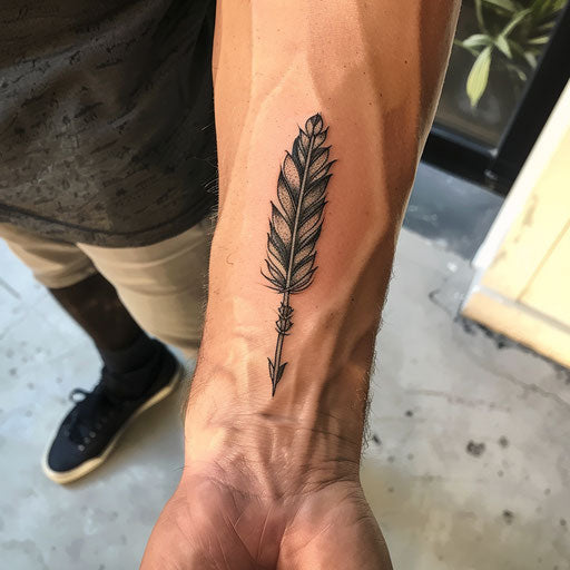Wrist tattoos for men with feather and arrow