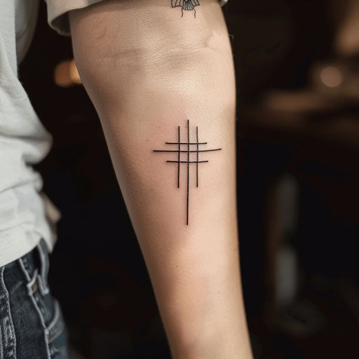 Minimalist strength cross tattoo with bold geometric lines