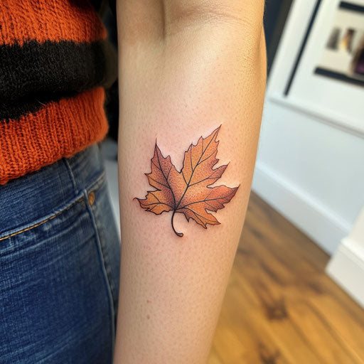 Small arm tattoos with leaf in the wind