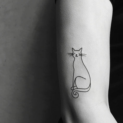 Minimalist flat tattoo sketch of a cat silhouette in one line