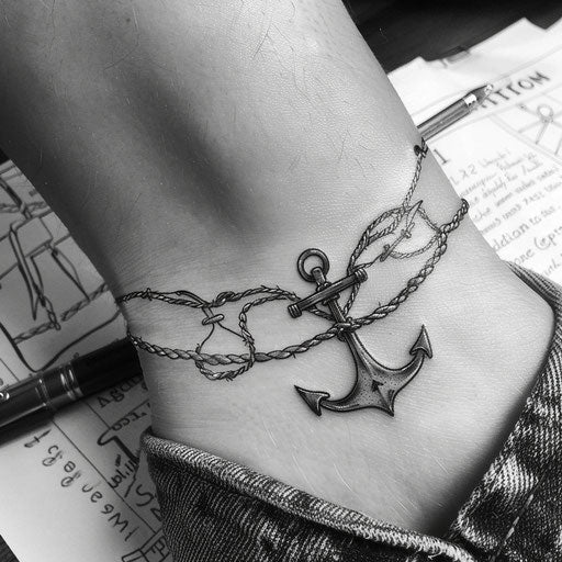 Flat tattoo sketch of a nautical ankle bracelet design