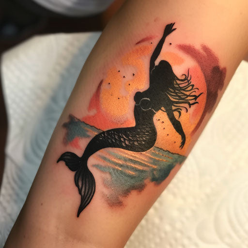 Sunset mermaid tattoo