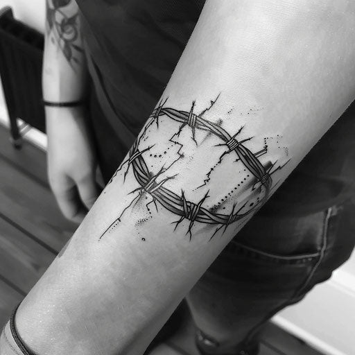 Bold flat tattoo sketch of a wrist band with barbed wire details