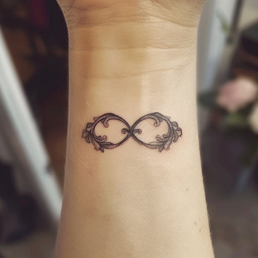 Infinity wrist tattoo in the style of Maria Sibylla Merian