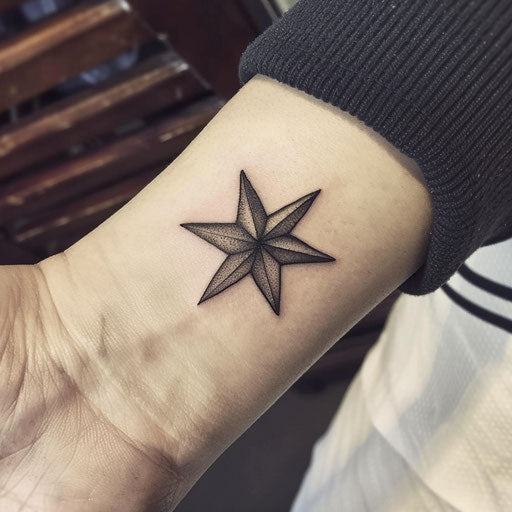 Minimalist nautical star with black outline on white background