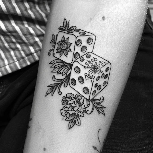 Dice tattoo with floral motifs
