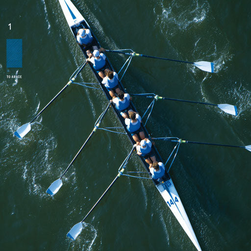 Aerial view of a crew boat gliding across the water