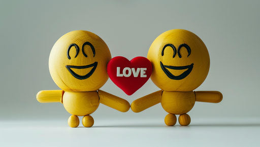 Joy in emoji form with red heart and text