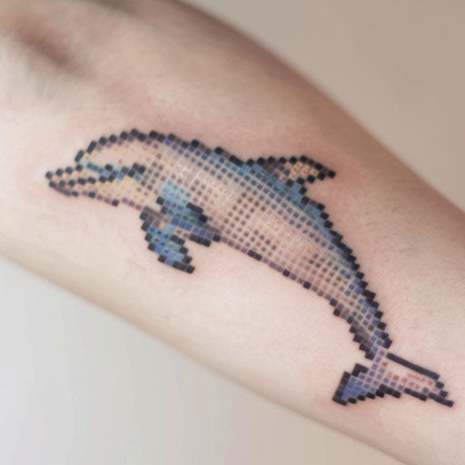 Pixel art dolphin tattoo on white background