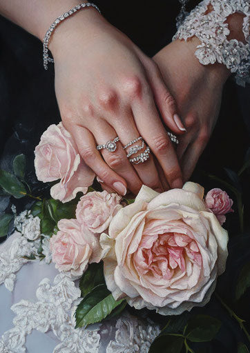 Intertwined hands, roses, rings, black background, wedding dresses