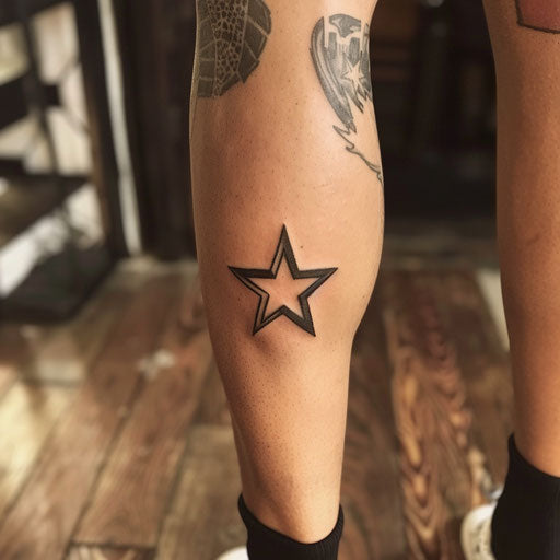 Leg tattoos for women in the style of Ami James featuring a minimalist star