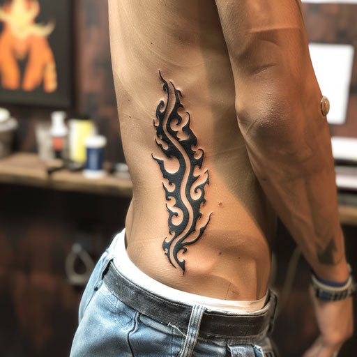 Tribal flame rib tattoos