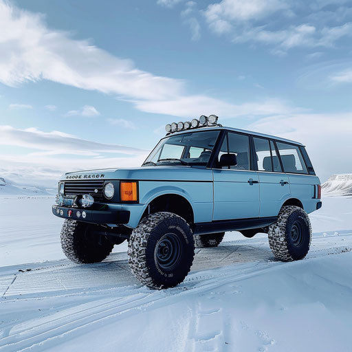 Sky blue SUV with oversized tires in snowy Arctic