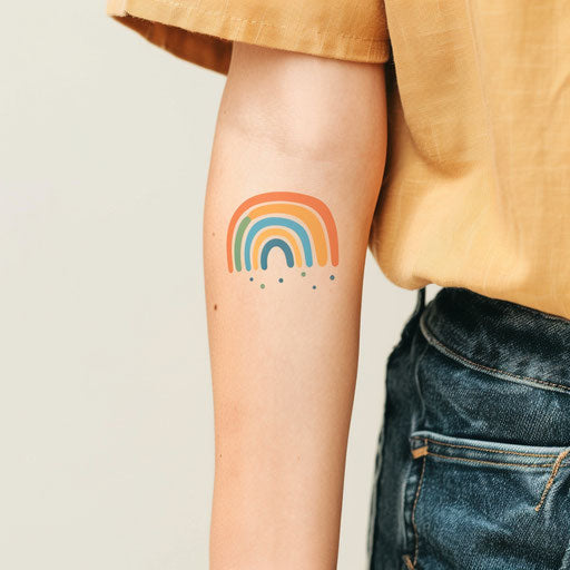 Minimalistic and subtle rainbow tattoo sketch
