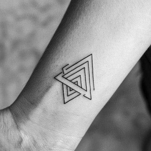 Simple and elegant triangle tattoo design