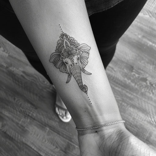 Sketch of intricate elephant with mandala patterns for wrist coverup tattoo for women