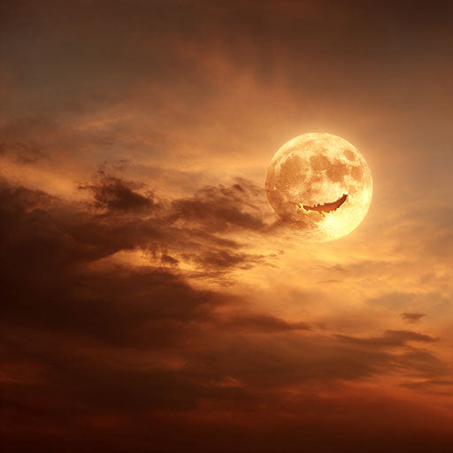 A full moon with a jack-o'-lantern face