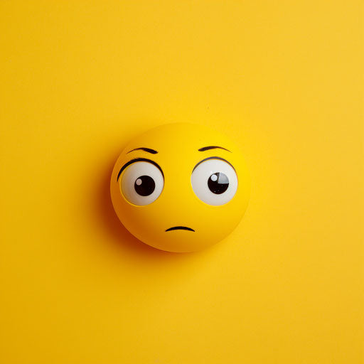 Yellow smiling emoticon with sad eyes on yellow background
