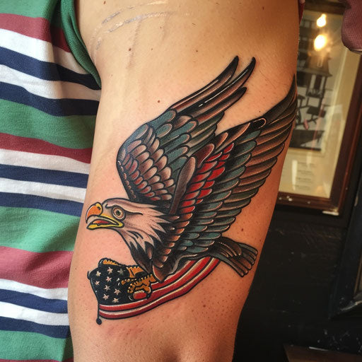 Bicep tattoo of a traditional eagle and flag, Sailor Jerry style