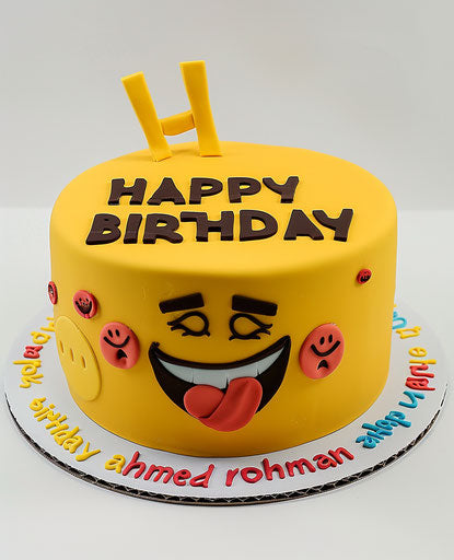 Birthday celebration with a yellow emoji cake