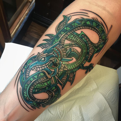 Dynamic Mayan serpent in green and blue on white