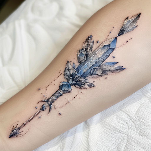 Ice-themed arrow tattoo with crystal effects on white backdrop
