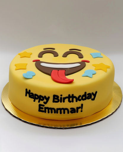 Yellow smiley face cake with happy birthday