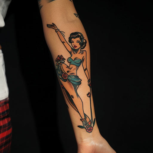 Forearm tattoo with a pin-up girl, in the style of Ed Hardy