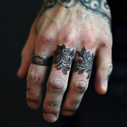 Wedding ring tattoo with vine or leaf pattern