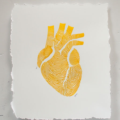 Electric heart tattoo in yellow on white paper