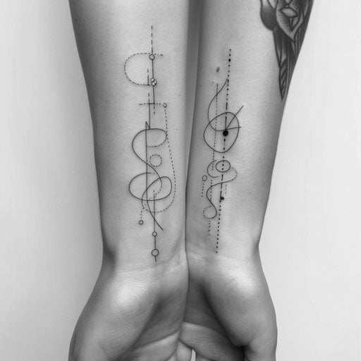 Minimalist line and dot tattoos for mother and daughter