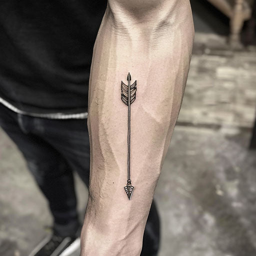 Simple arrow tattoo, Steve Sack style, on forearm