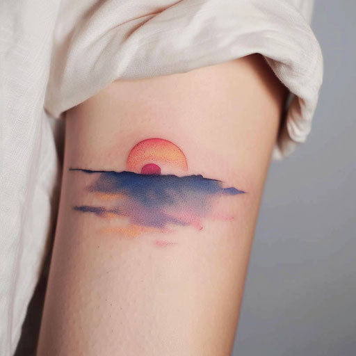 Watercolor sunset tattoo