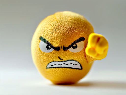 Angry emoticon pointing at white background