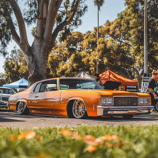 Sleek and low, a slammed 1976 Malibu Classic with air suspension, at a car enthusiast meetup.