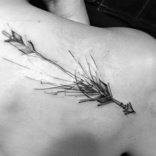Sporty arrow tattoo, symbolizing speed and precision