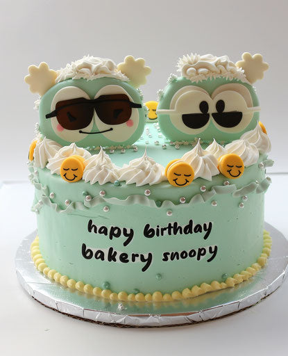 Mint green cake with emoji to celebrate the "t旋律 s" bakery