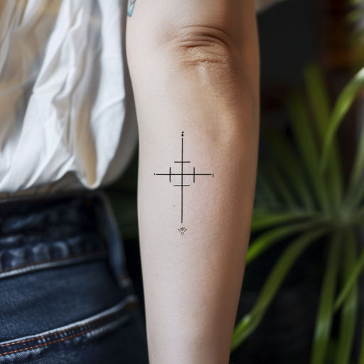 Minimalist strength cross tattoo with bold geometric lines