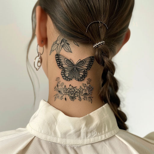 Butterfly neck tattoo with botanical details